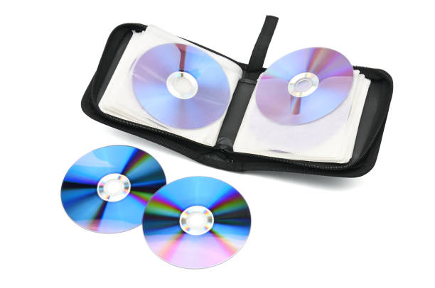 корпус для компакт-дисков и dvd-дисков на изолированном белом фоне - cd dvd disk lock стоковые фото и изображения