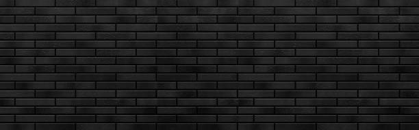 istock Panorama of Modern black brick wall texture for background 1151500808