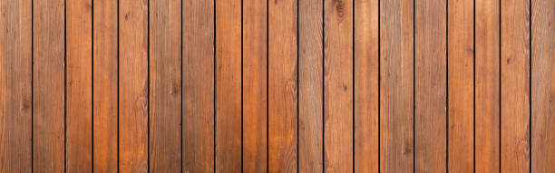panorama della trama e dello sfondo della recinzione in legno marrone - wood reclaimed abstract dark foto e immagini stock