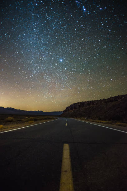istock Night time and dark sky over death valley national park 1151502818