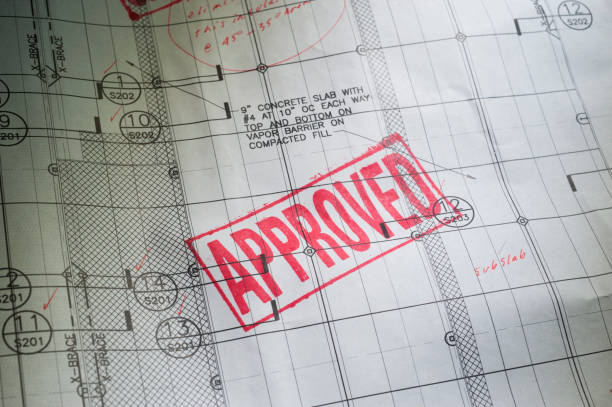 Blueprint with APPROVED rubber Stamped stock photo