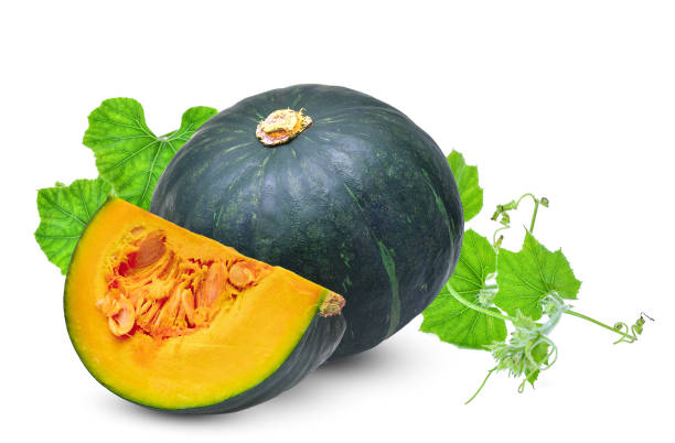 whole and slice green pumpkin with leaf isolated on white background