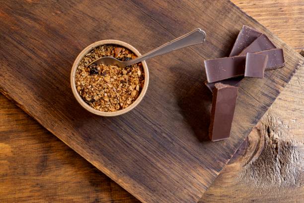 Bowl with granola and chocolate bar.
