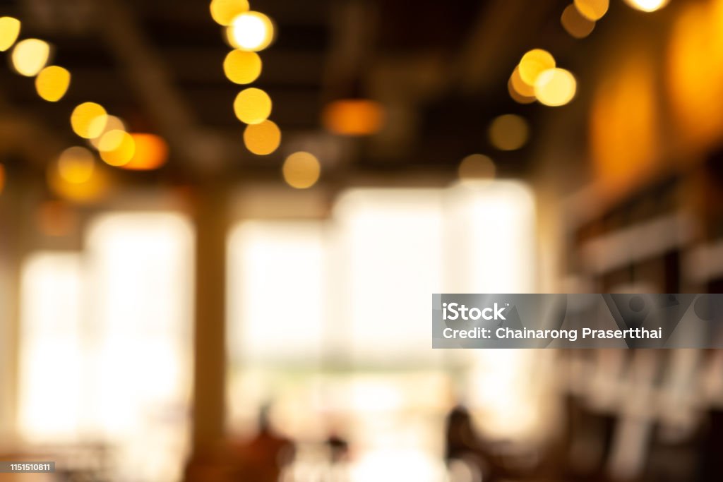 abstract blurred beautiful inside interior of modern restaurant nightclub retail background for design concept Focus On Foreground Stock Photo