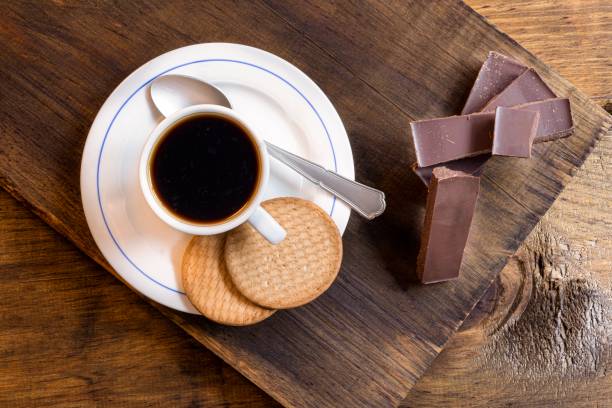 istock Espresso coffe with cookies and chocolate bars 1151512247