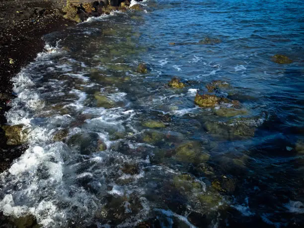Rocky Shore And Seabed With Small Waves In The Morning At Umeanyar Village, North Bali, Indonesia