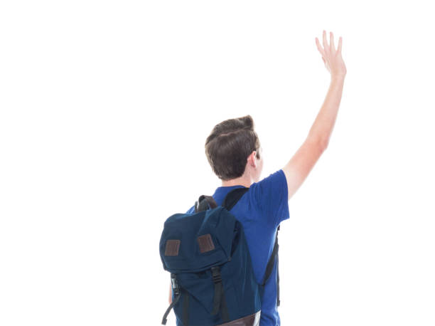 istock Young high school age male student is waving 1151522940