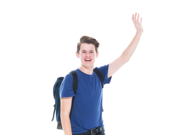 Handsome young male teenager on white background
