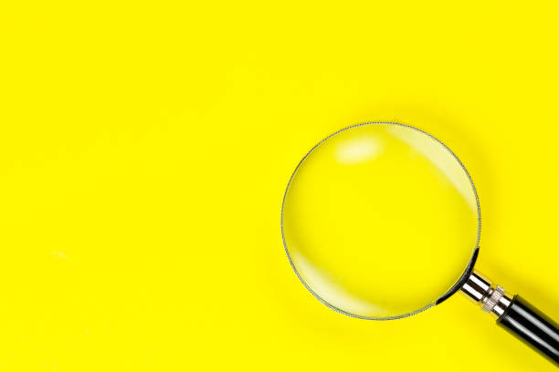 istock magnifying glass on yellow 1151522994