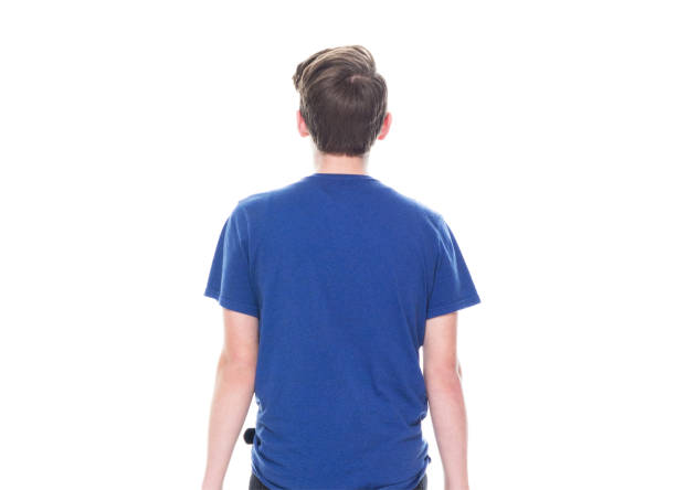istock Young high school age male walking 1151525248