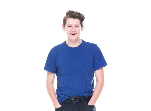 Handsome young male teenager on white background