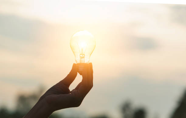 istock Innovation or creative concept of hand hold a light bulb and copy space for insert text. 1151526912