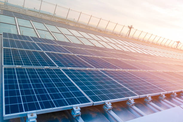 istock solar cell panels on rooftop , Save energy concept 1151527242