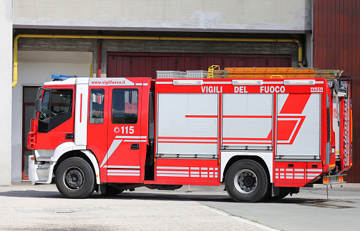Rome, Italy - May 16, 2019: red fire engine of Italian firefighters with the number 115 to call in an emergency