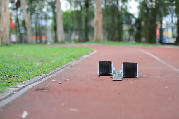 Athletics Starting Blocks and red running tracks in a stadion