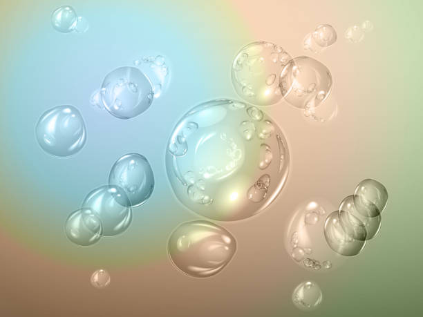 istock Falling water with large transparent air bubbles. The flow of flying water droplets on a rainbow background 1151535656