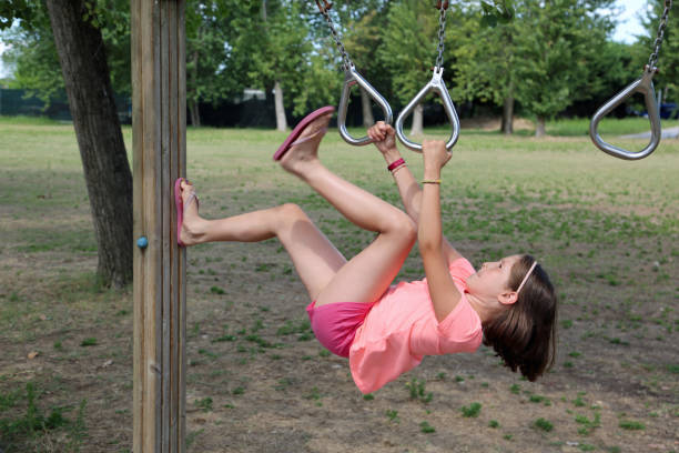 istock girl does a gymnastic exercise in a health path 1151536361