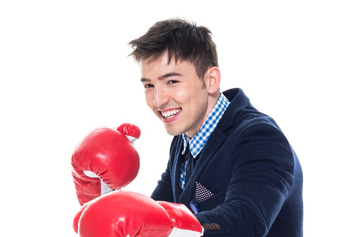 Keep fighting the good fight. Happy businessman hold boxing gloves together. Man boxer in formal suit. Join the fight.