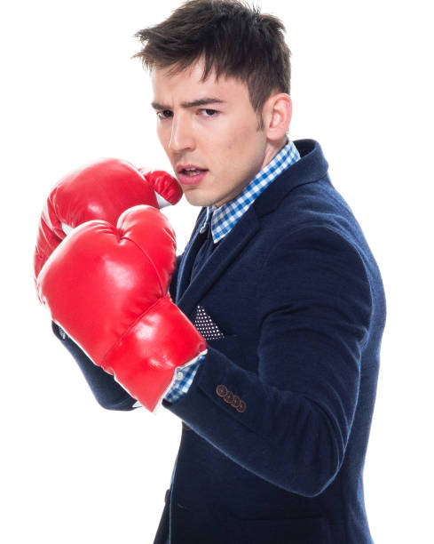 istock Attractive businessman is boxing 1151538365