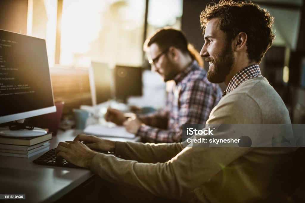 Photo For Coding Profile View Of Happy Programmer Coding Computer Language On Pc In The ...