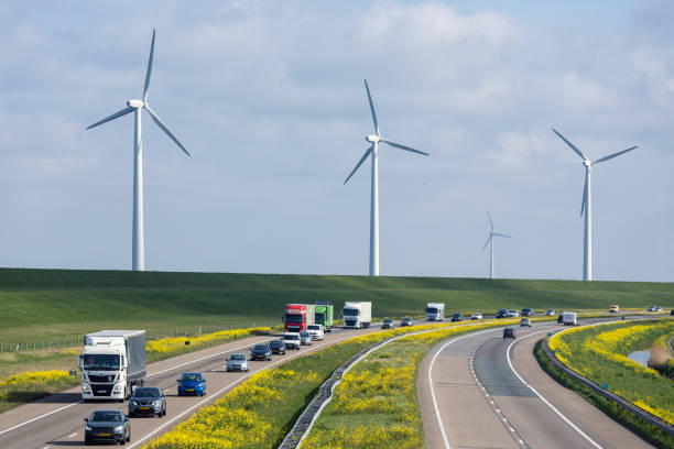 Dutch motorway near Lelystad with wind turbines and blooming rapeseed Lelystad, The Netherlands- April 5, 2019: Dutch motorway A6 near Lelystad with wind turbines and blooming rapeseed flevoland photos stock pictures, royalty-free photos & images