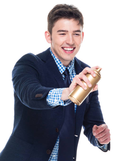 istock Attractive businessman is using a spray can 1151544613