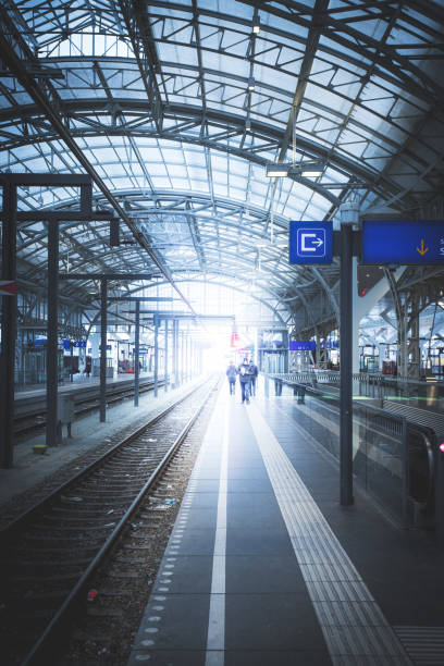 istock Travelling scene on a train station, public transport: rail platform or track 1151545012