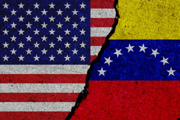 istock concrete wall with painted united states and venezuela flags 1151546155