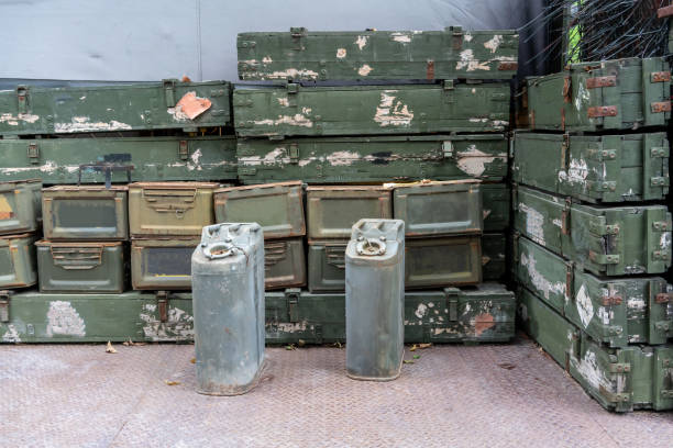 stack of green and old rusty ammunition box. Military green ammunition boxes.