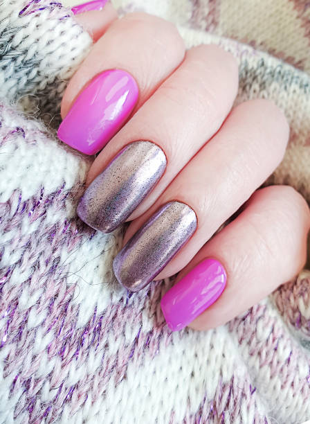istock female hand manicure sweater 1151547897