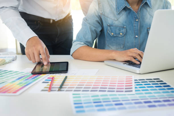 istock Midsection Of Businessmen Using Technologies At Desk In Office 1151551701