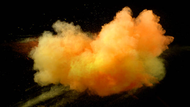 istock Collision of colored powder isolated on black 1151554314