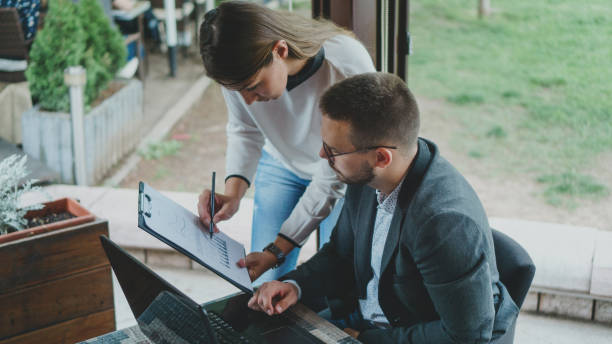 istock Coworkers working and planning in office 1151554844