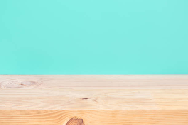 istock Empty of wood table top on blue pastel color background 1151563189