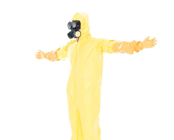 istock Man in protective clothing with arms outstretched 1151564991