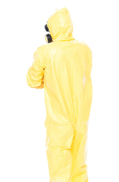 istock Man in protective clothing with arms folded 1151565702