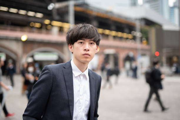 istock Young businessman waiting someone on street 1151566414