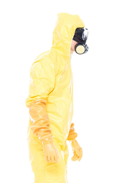 istock Man in protective clothing standing on white background 1151567989