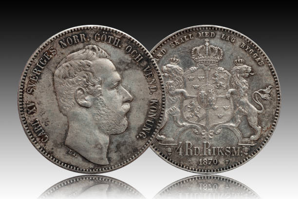 istock Sweden Norway silver coin four 4 thaler rigsdaler minted 1870 Carl XV isolated on gradient background 1151568799