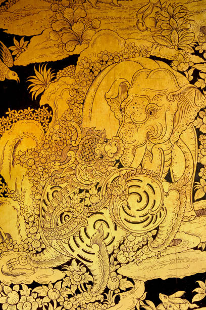 istock lion and elephant Scene Painted on a Temple Windows 1151569913