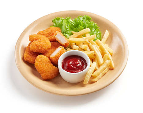 plate with chicken nuggets and french fries food isolated on white background