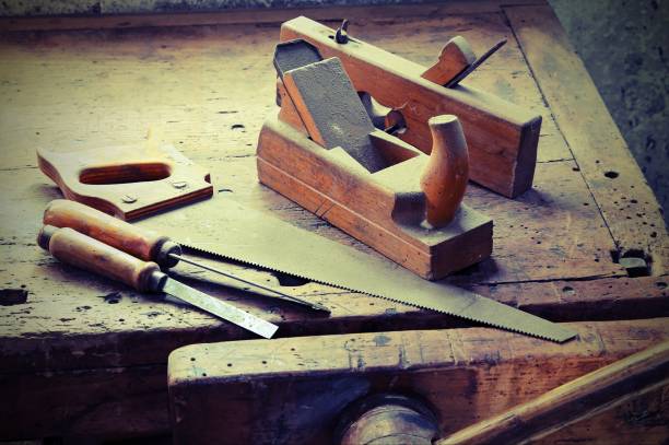 istock planes and chisels and a saw  with vintage old toned effect 1151572128