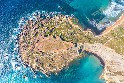 Gnejna and Ghajn Tuffieha bay on Malta island. Aerial view View from the top exactly of the coastlinescenic sliffs near the mediterranean turquoise water sea