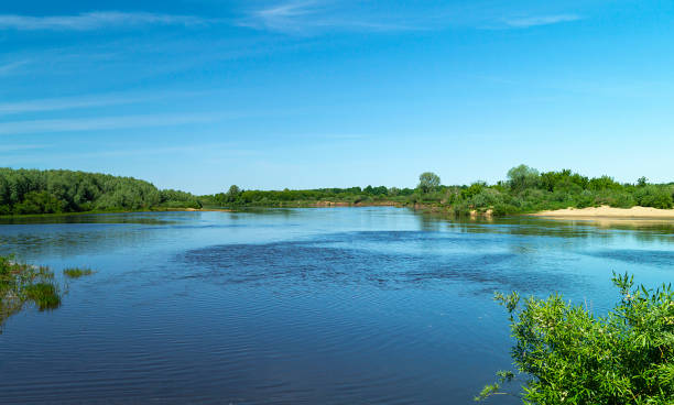 istock River in rural terrain at spring length of time 1151574643