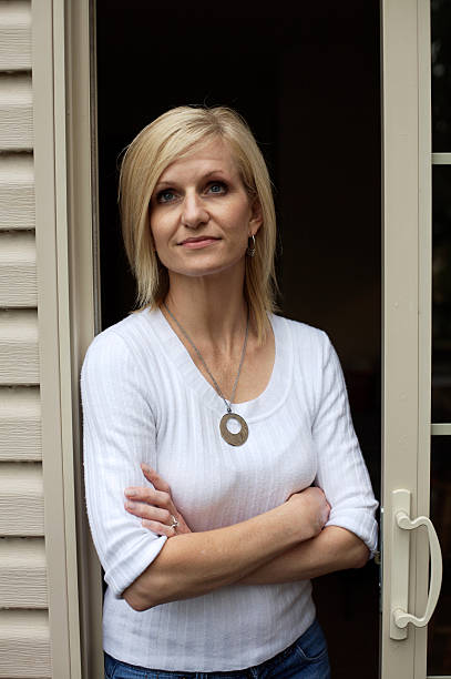 istock beautiful middle-aged woman portraits 115157648