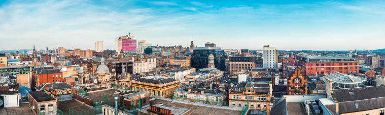 Glasgow / Scotland - February 15, 2019: A wide stitched panoramic looking out over buildings in Glasgow city centre, Scotland, United Kingdom