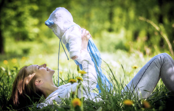 istock Happy Mother having fun with her baby 1151578831