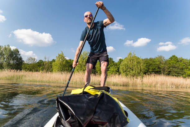 istock Stand up Paddling - Tour with luggage 1151584130