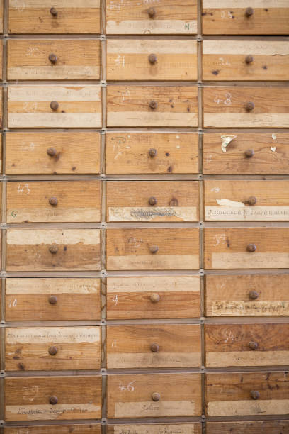 istock Old and Worn Multiple Wooden Drawers with Numbers 1151586893