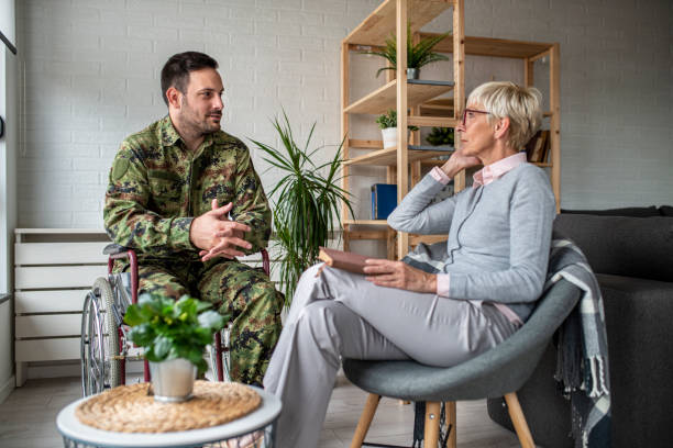 istock Depressed soldier and his psychotherapist during a session 1151588322